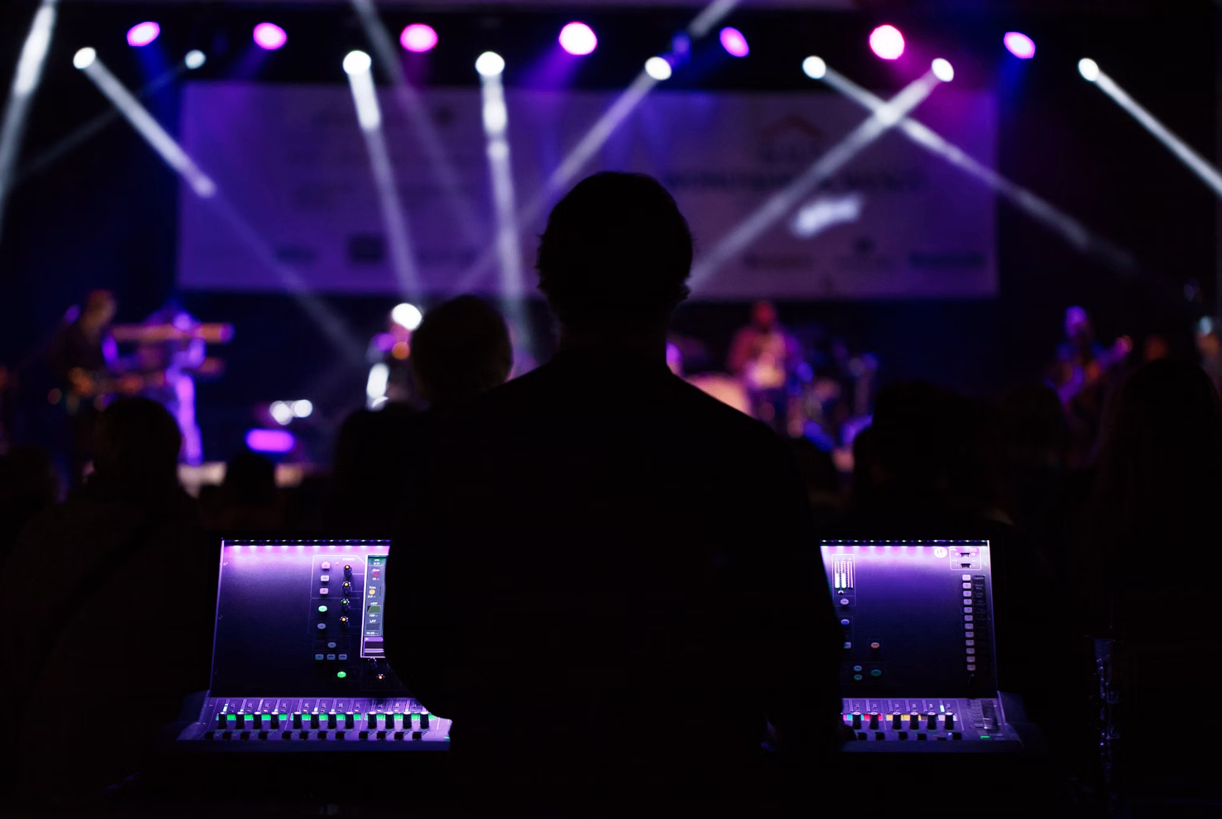 Front of house engineer mixing a live concert
